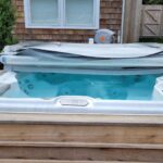 Uncovered hot tub on deck