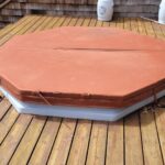 Hot tub built into wooden deck